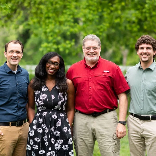 4 Keswick employees smiling